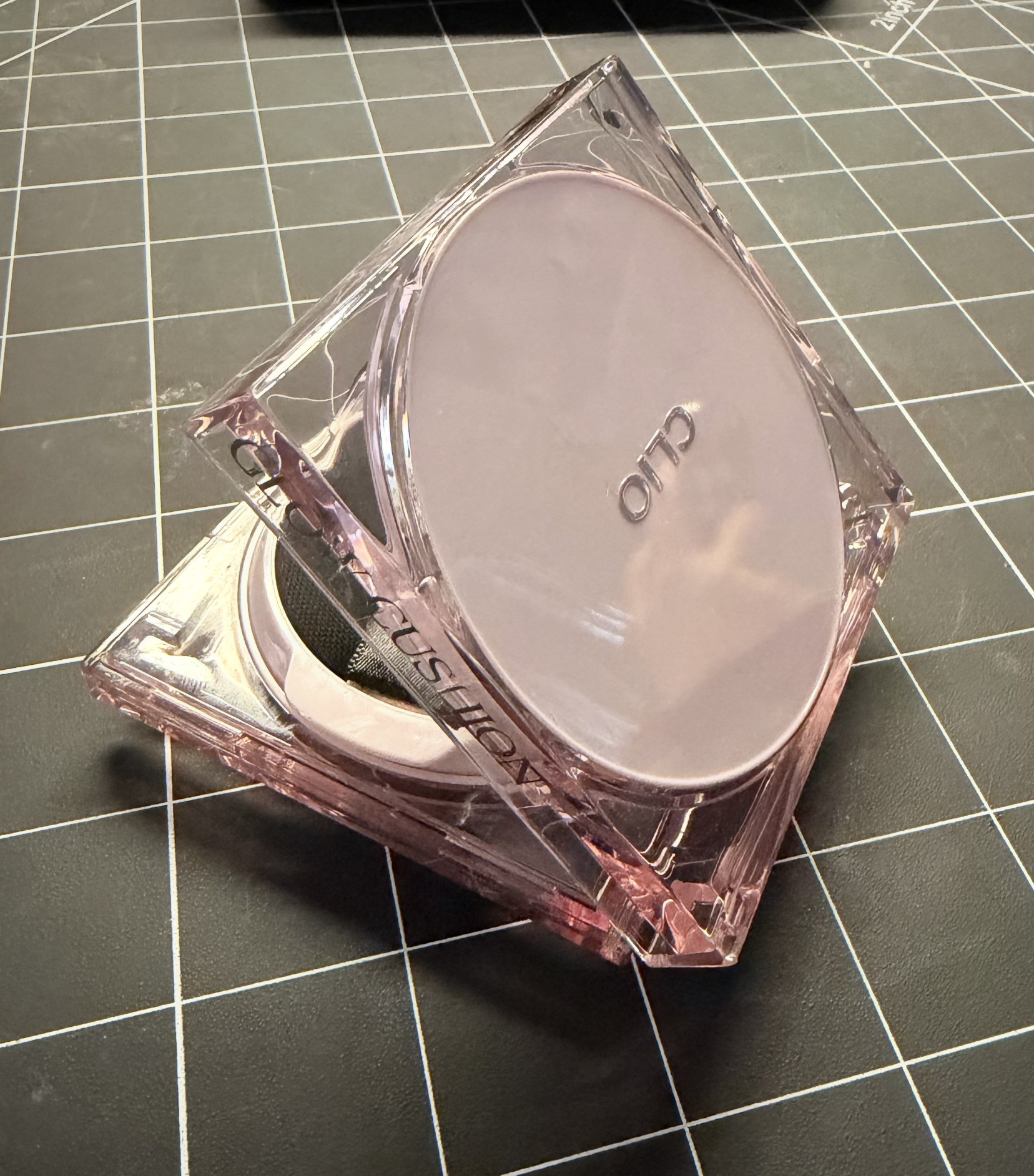 Makeup foundation cushion, opened case from the back/side.