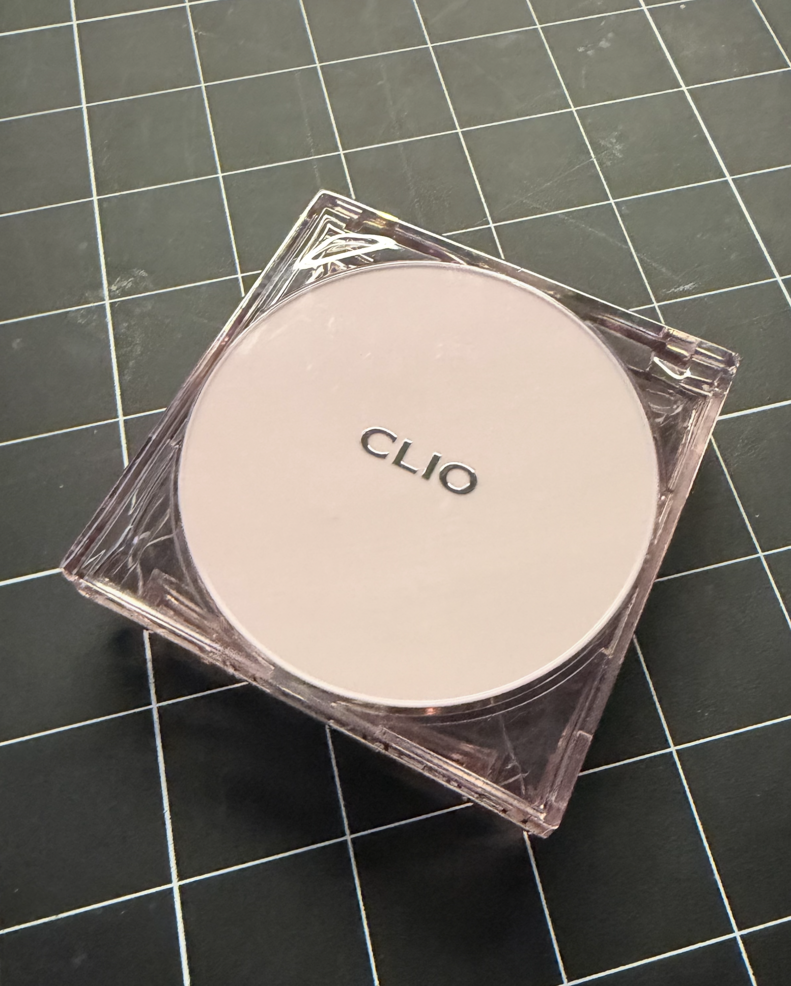 Makeup foundation cushion, closed case from top view.